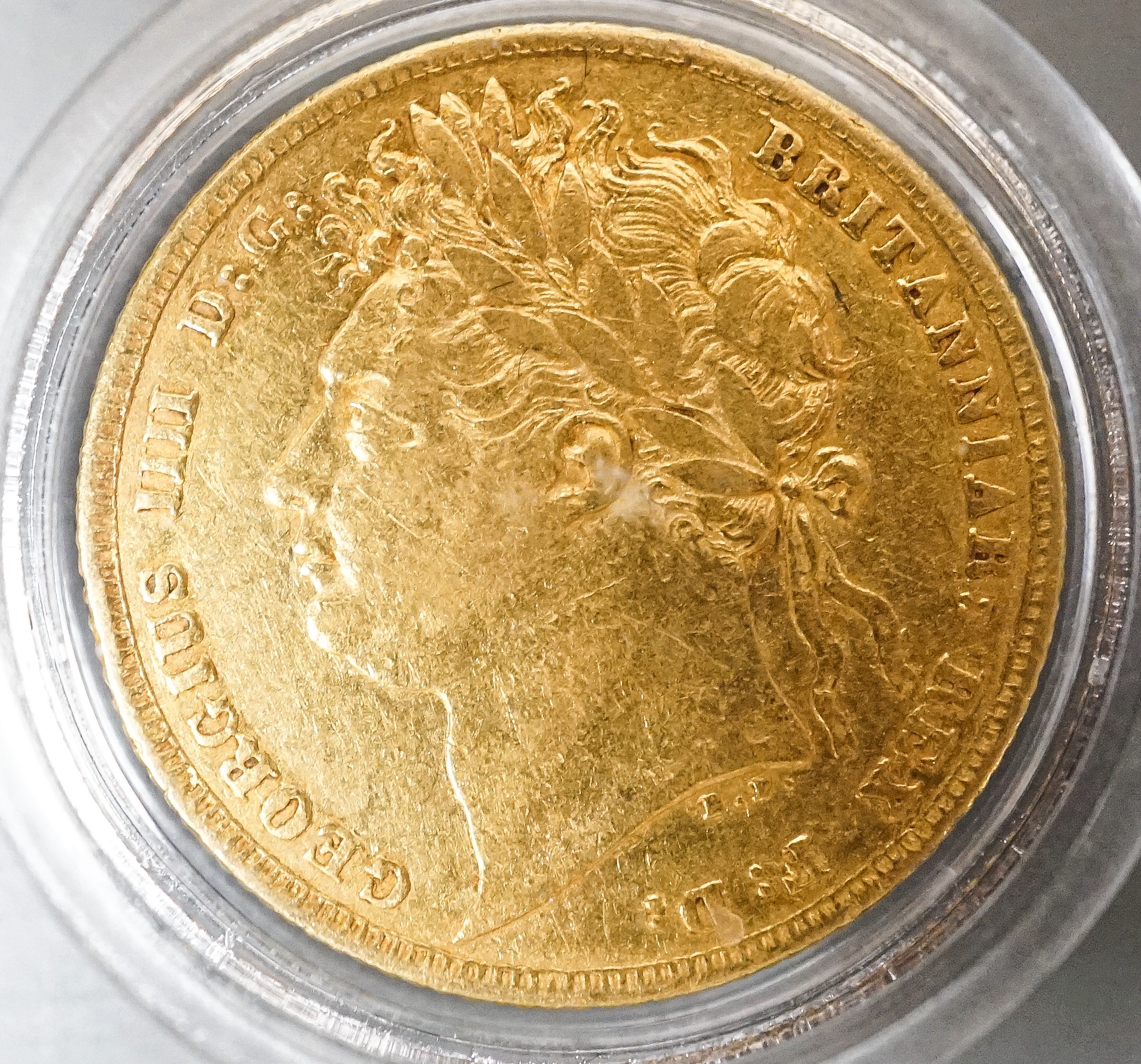 A George IV gold sovereign 1822, Good F, London mint presentation case.